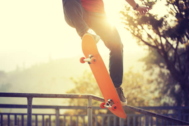 istock Skateboarder skateboarding at skatepark ramp 1097755992