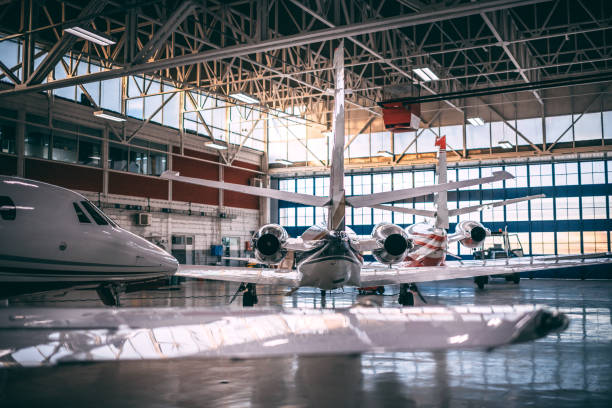 istock Small airplanes parked in a hangar 1097758136