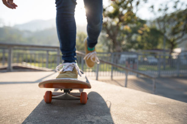 istock Skateboarder skateboarding at skatepark 1097762236