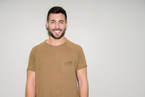 istock Young handsome man over isolated background with a happy face standing and smiling with a confident smile showing teeth 1097762340