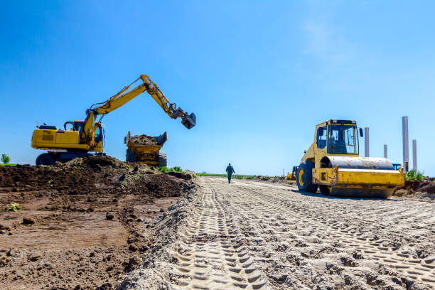 istock Trace of huge road roller with spikes to compact soil at construction site 1097762626