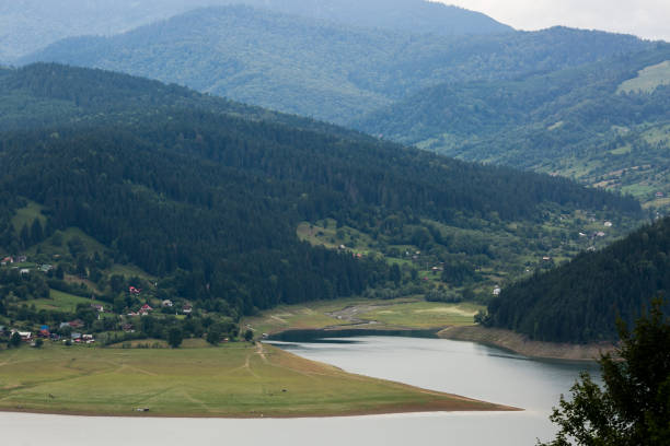 istock Cloudy landscape view from Lake Bicaz in Romania 1097764472