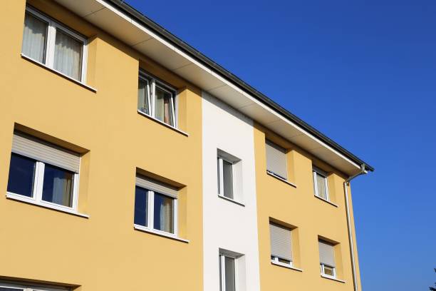 istock Apartment building with new facade painting 1097765190