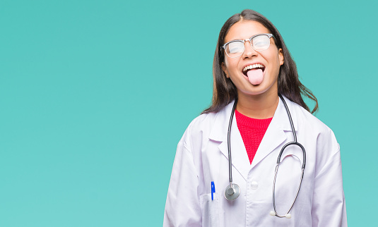 Young Arab Doctor Woman Over Isolated Background Sticking Tongue Out Happy  With Funny Expression Emotion Concept Stock Photo - Download Image Now -  iStock