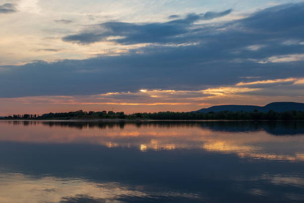 istock Sunset on a lake in Hohenrode in Germany 1097775218