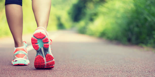 istock Young woman runner legs ready for running on trail 1097776226