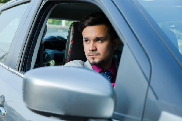 istock Business Man Driving the Car - Stock image 1097776796