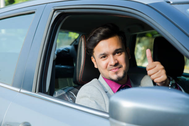 istock Business Man Driving the Car - Stock image 1097777370