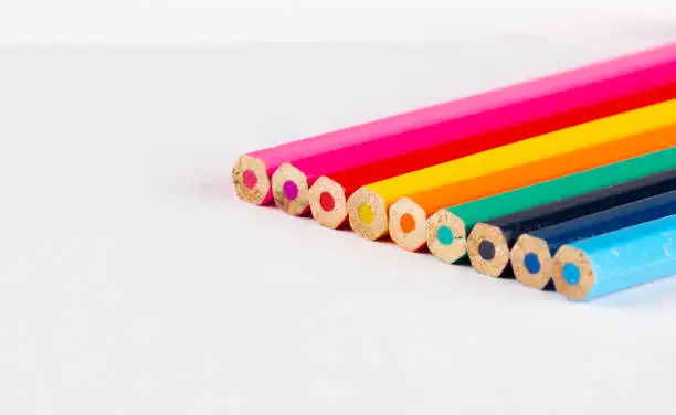 close up of various ends of coloured pencils used in art