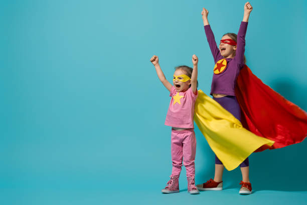 istock children playing superhero 1097784060