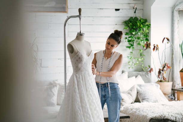 istock Fashion designer creating gowns 1097786128