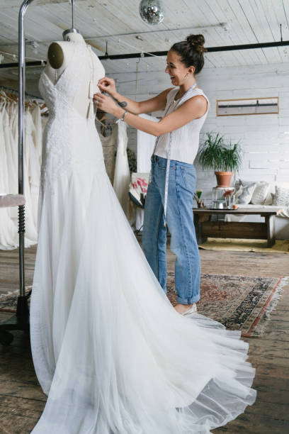 istock Fashion designer creating gowns 1097786210