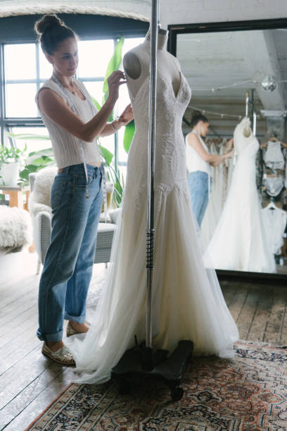 istock Fashion designer creating gowns 1097786476