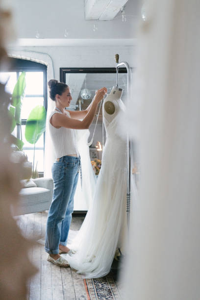 istock Fashion designer creating gowns 1097786754