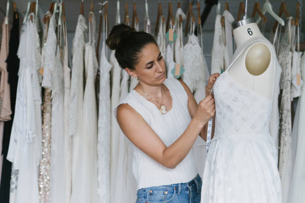 istock Fashion designer creating gowns 1097786874