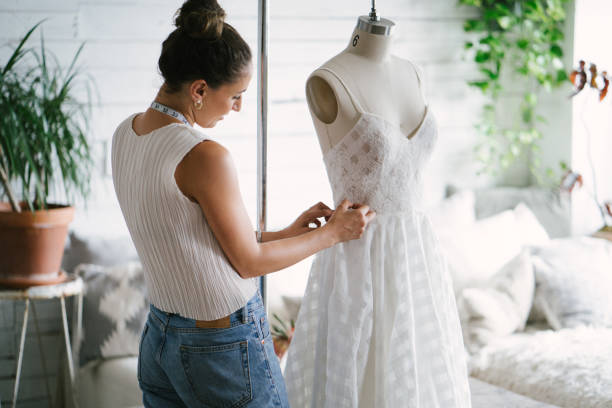 istock Fashion designer creating gowns 1097786940