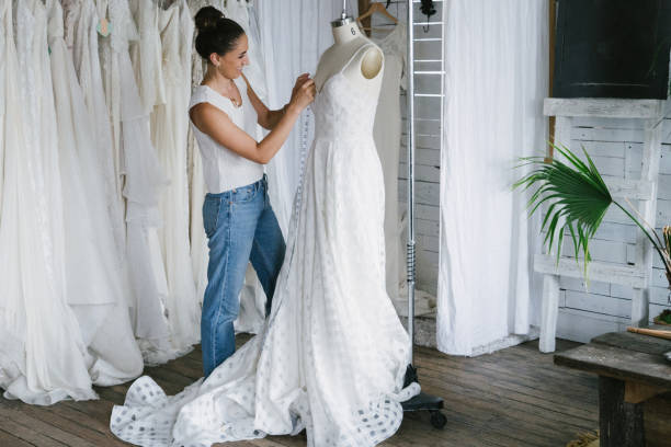 istock Fashion designer creating gowns 1097787144
