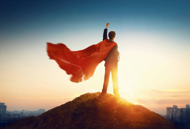 istock superhero businessman looking at city 1097787392