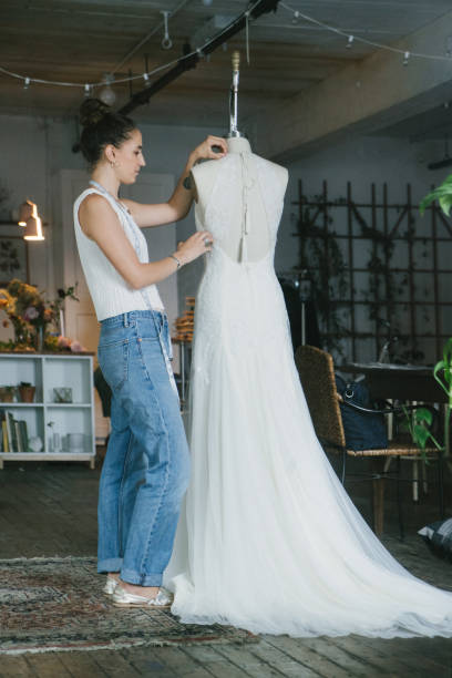 istock Fashion designer creating gowns 1097789398