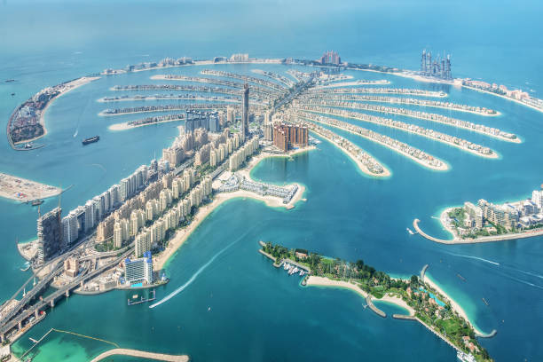 Aerial view of Dubai Palm Jumeirah island, United Arab Emirates Aerial view of Dubai Palm Jumeirah island, United Arab Emirates dubai island stock pictures, royalty-free photos & images
