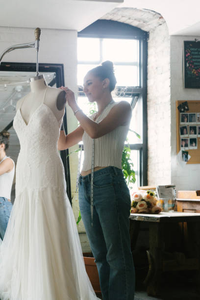 istock Fashion designer creating gowns 1097789918