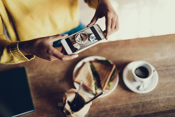 istock Inspired lady making photo her food on cellular 1097790906