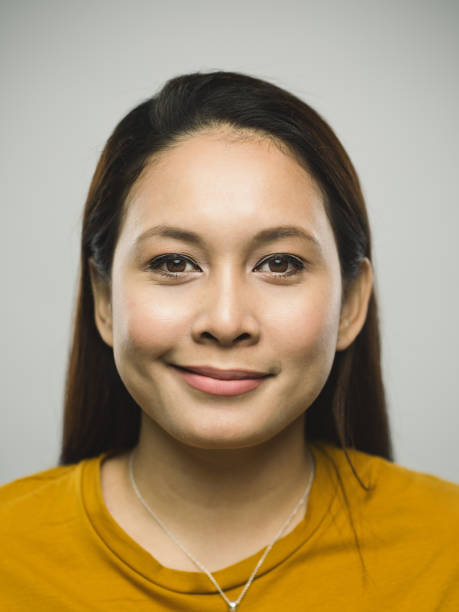 Real malaysian young woman with smirking expression