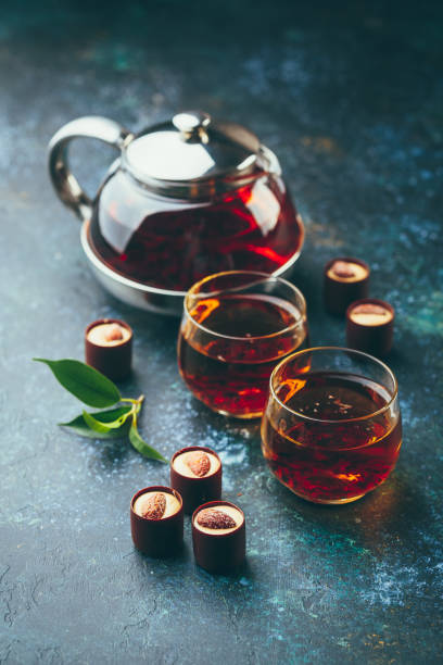 istock Glass cups of tea and teapot on the table 1097794572