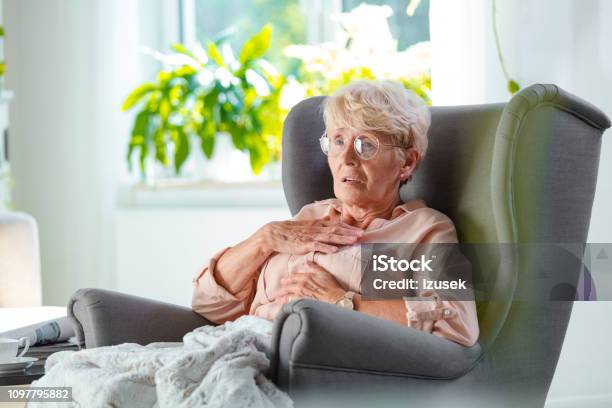 Worried Elderly Lady Having Pain In Chest Stock Photo - Download Image Now - Fear, Senior Women, Senior Adult