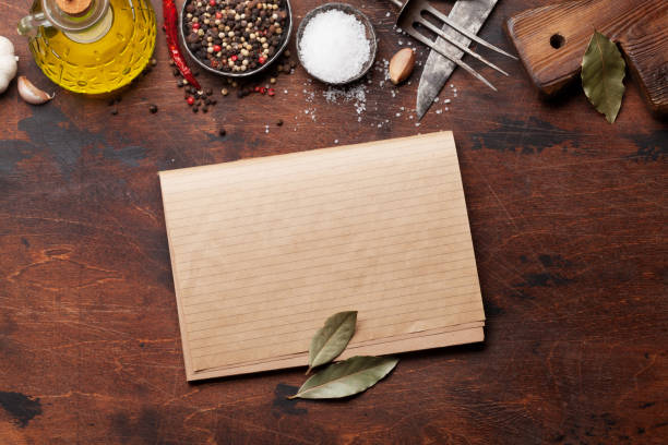 istock Set of various spices and herbs and cookbook 1097795912