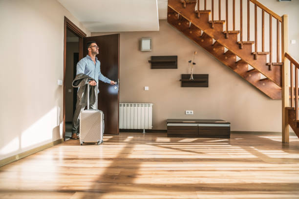 istock Businessman entering his hotel room 1097796676