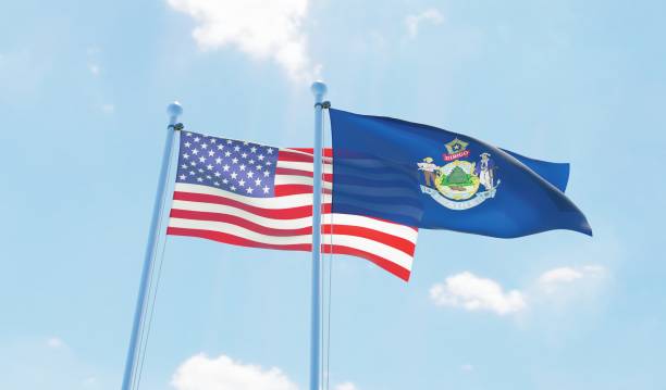 istock USA and state Maine, two flags waving against blue sky 1097803600
