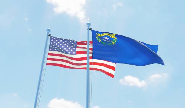 istock USA and state Nevada, two flags waving against blue sky 1097803838