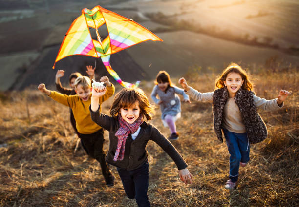 istock Playing with kite in autumn day! 1097811060