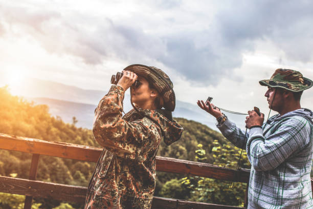 istock Camouflage patrol in the forest 1097811770
