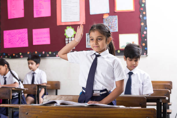 istock Schoolkids in classroom - Stock image 1097816572