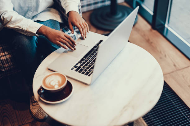 istock Lady is holding her hands on laptop 1097823280