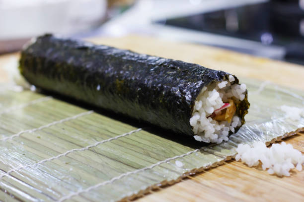 istock The process of making Japanese rolls and sushi 1097825956