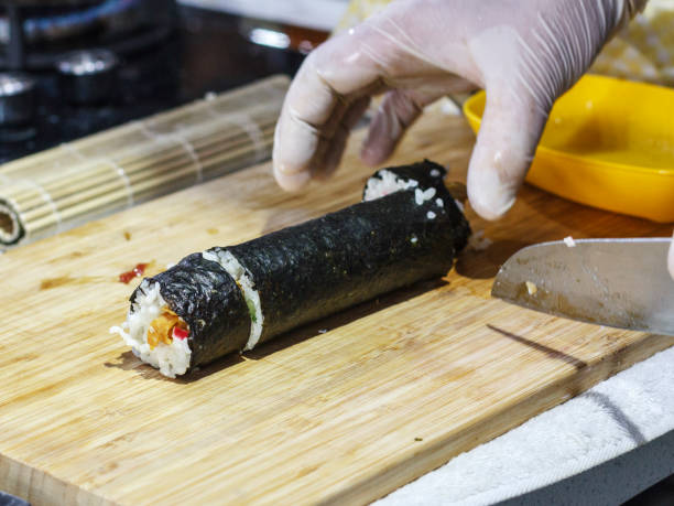 istock The process of making Japanese rolls and sushi 1097825982