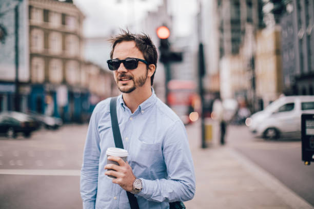 istock Man on coffee break in city 1097826346