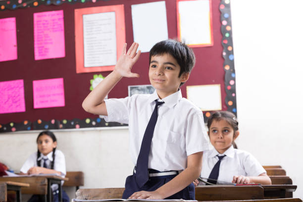 istock Schoolkids in classroom - Stock image 1097830942