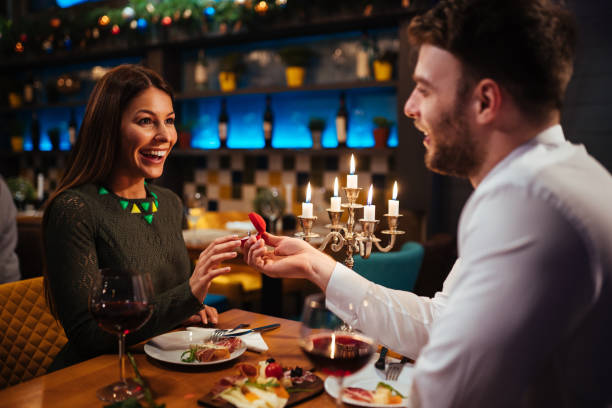 istock Surprised woman looking at engagement ring 1097831468