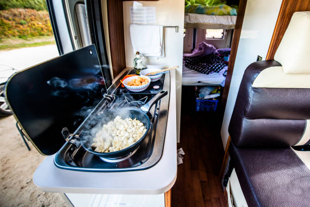 Cooking dinner or lunch in campervan, motorhome or RV.