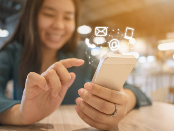 istock Woman hand using smart phone. Contact us connection concept 1097835902