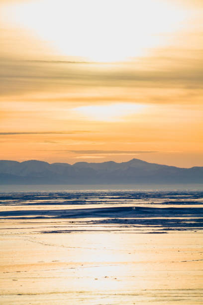istock The Baikal lake in winter during sunset 1097836640