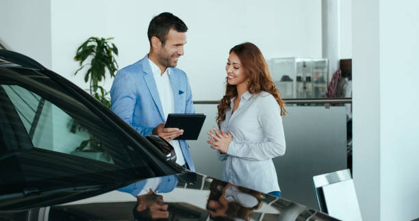 istock Car salesman with a customer 1097839364