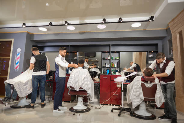 istock View from back of working process in vintage barber shop 1097840274