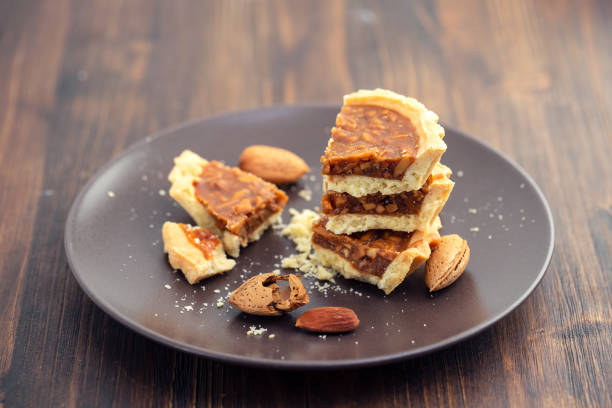 istock almond tart in small plate 1097840386
