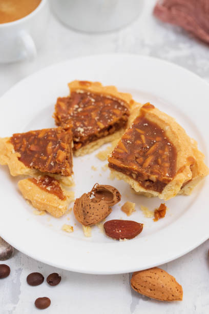 istock almond tart in small plate 1097840416