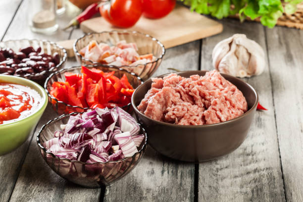 istock Ingredients ready for preparing chili con carne. Mincemeat, papr 1097842790